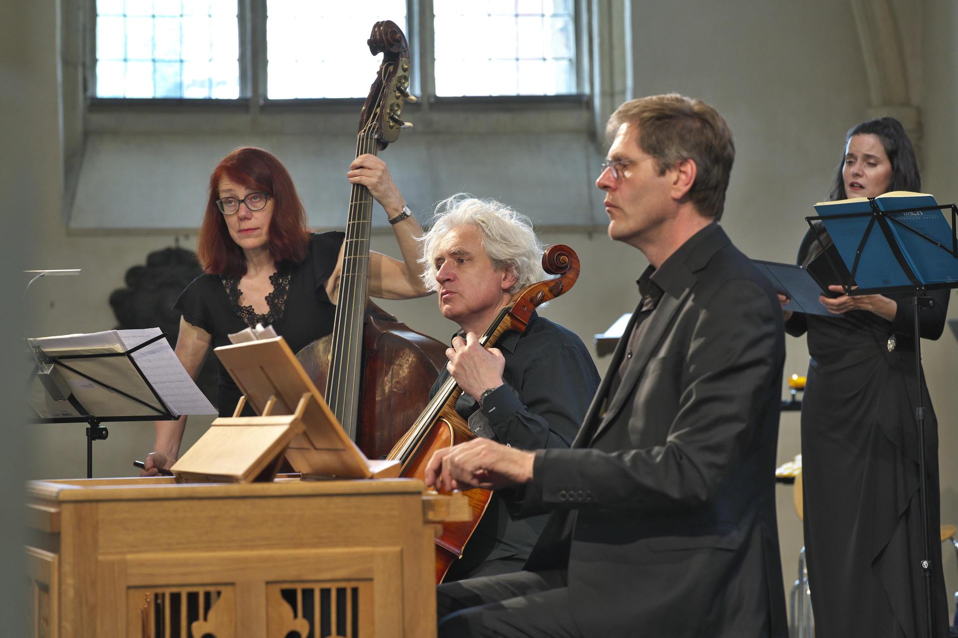 The Orchestra plays music on stage