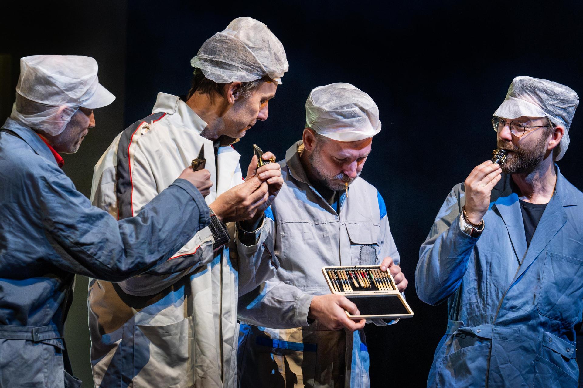 Calefax plays the music factory on stage in costumes